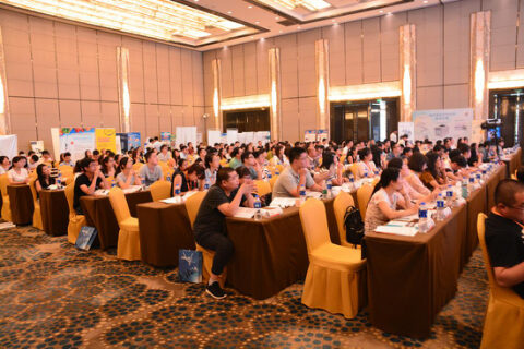 Audience seated at a food microbiology conference